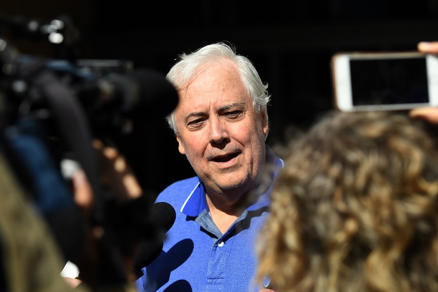 Businessman and former federal MP Clive Palmer speaks to the media