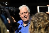 Businessman and former federal MP Mr Palmer speaks to the media