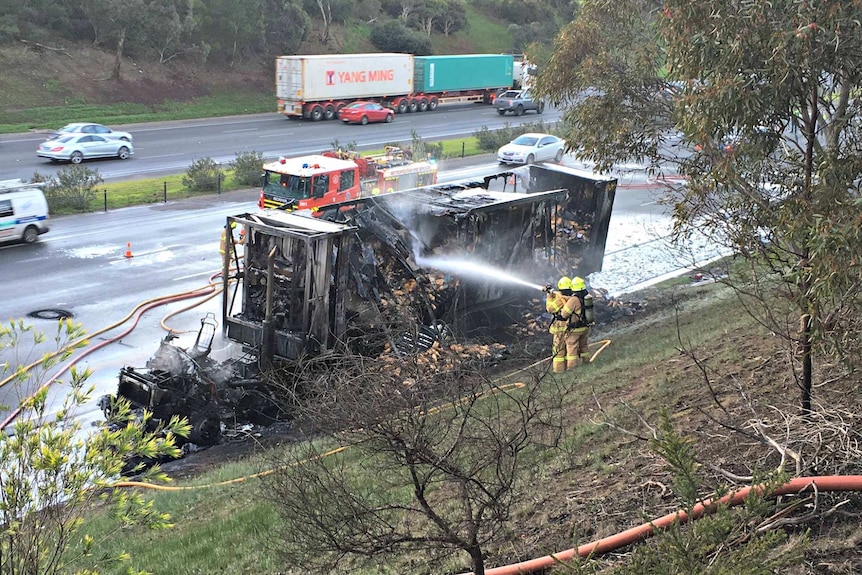 Burnt-out truck on Melbourne's Monash Freeway