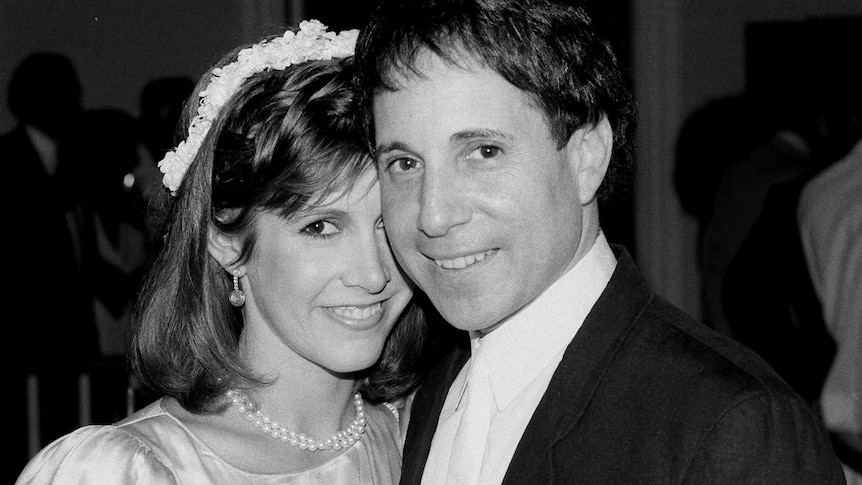 Carrie Fisher with musician Paul Simon, 1983