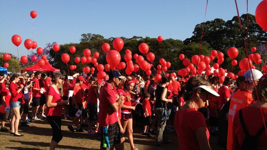 Crowd gathers on Qld's Sunshine Coast to march for Daniel Morcombe