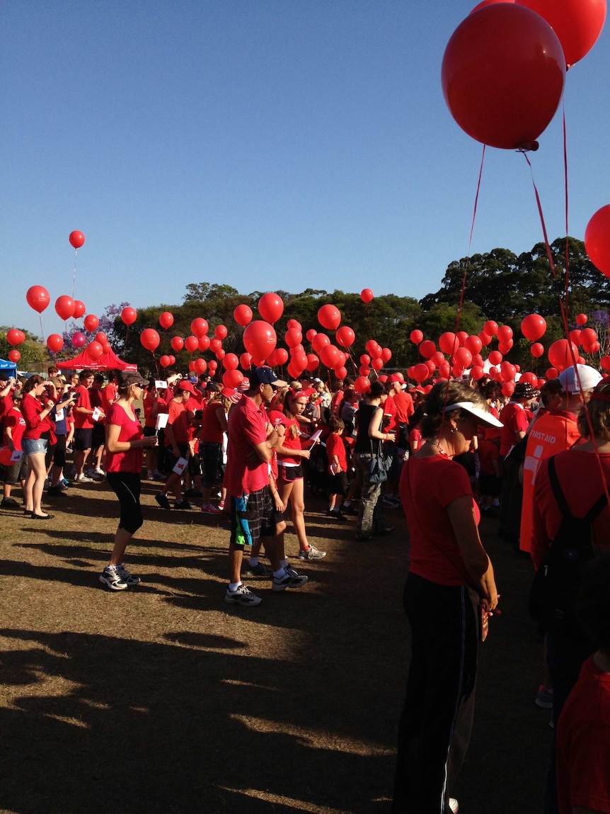 Crowd gathers on Qld's Sunshine Coast to march for Daniel Morcombe