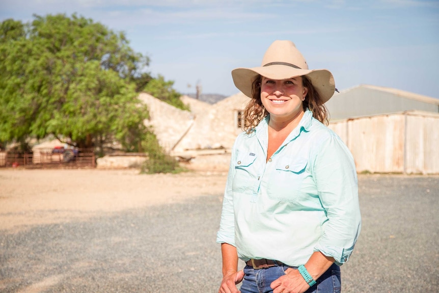 Mundrabilla Station owner Brie Campbell out the front of the old homestead.