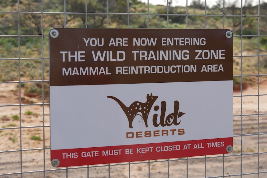 A sign on the Sturt National Park fence.