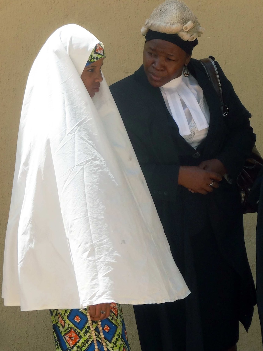 Nigerian child bride Wasila Tasi'u with her defence lawyer