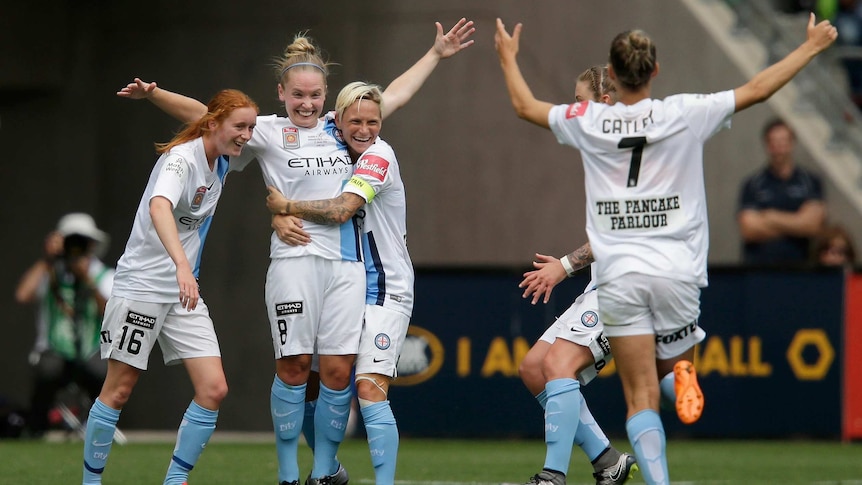 Kim Little of Melbourne City celebrates a goal with team mates during W-League grand final