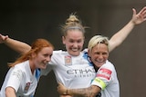 Kim Little of Melbourne City celebrates a goal with team mates during W-League grand final