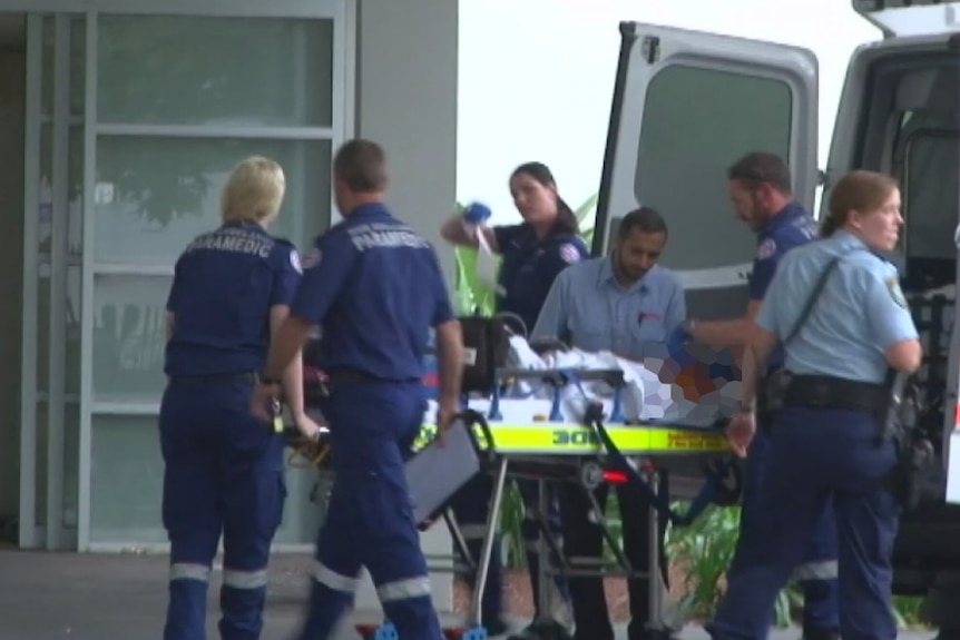 A baby with significant burns to his head, neck, chest and back arrives at Westmead Children's Hospital by ambulance.