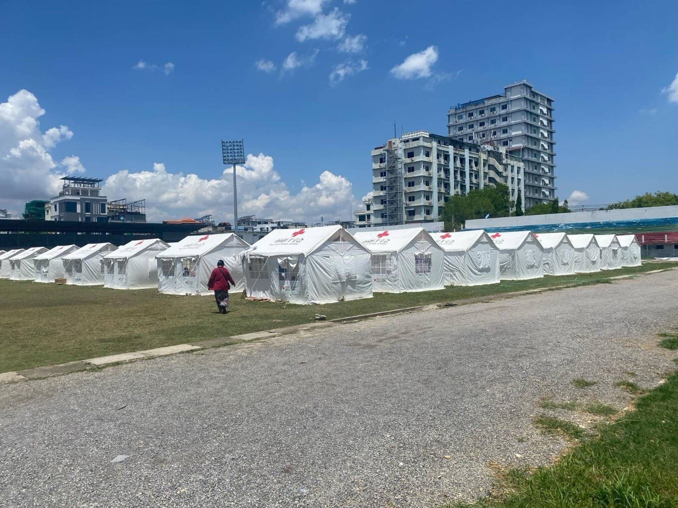 White tents with red cross on the sides.