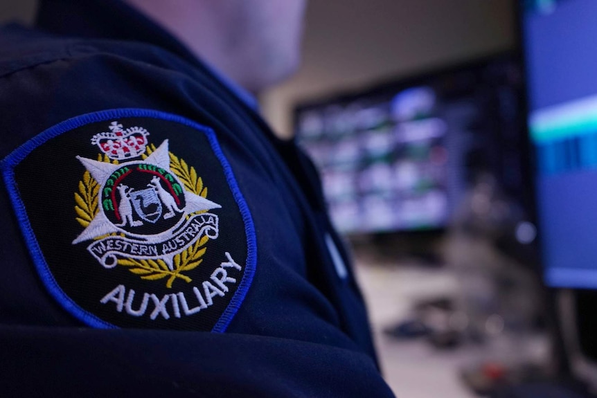 A close up of the patch on an auxiliary officer's uniform at the CityWatch surveillance centre in Perth.