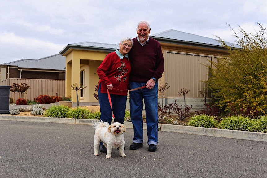 Ferne and Kenneth Fyfe walking their dog.