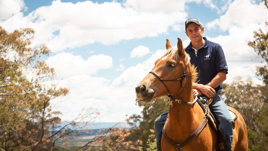 Mick Mason is saddled up on his brumby Coolabah