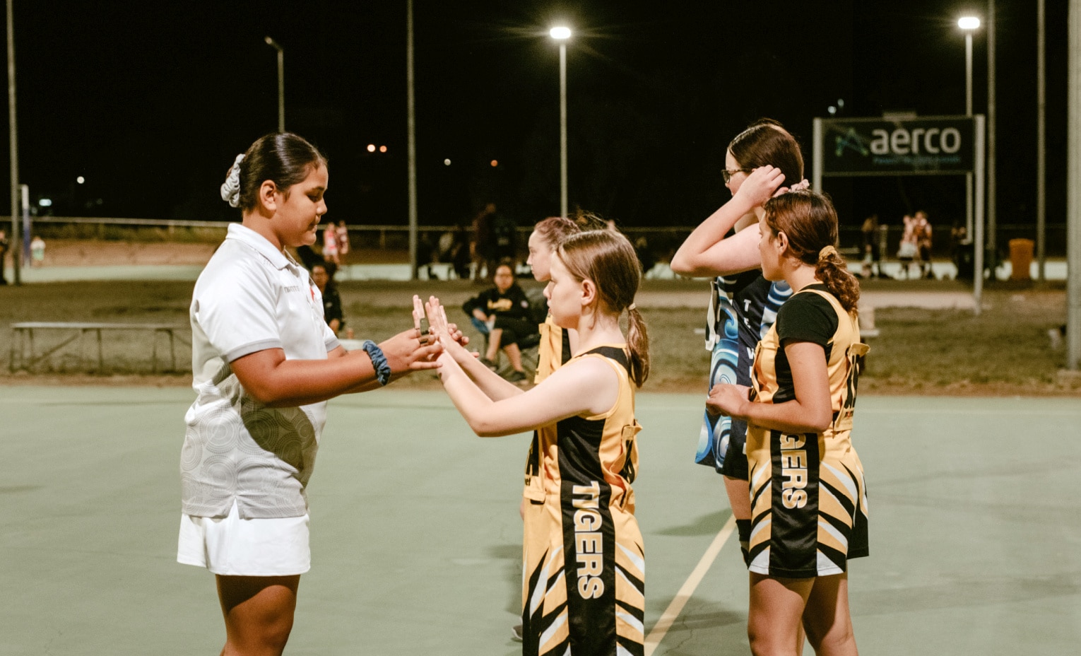 Netball Queensland's youngest umpire calls on more kids to take up the