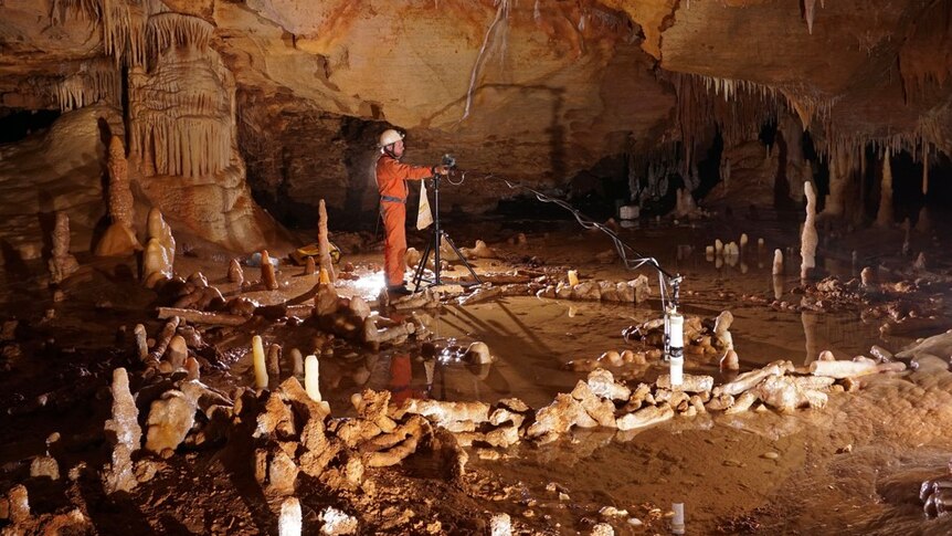 A cave containing circles made from broken stalagmites.