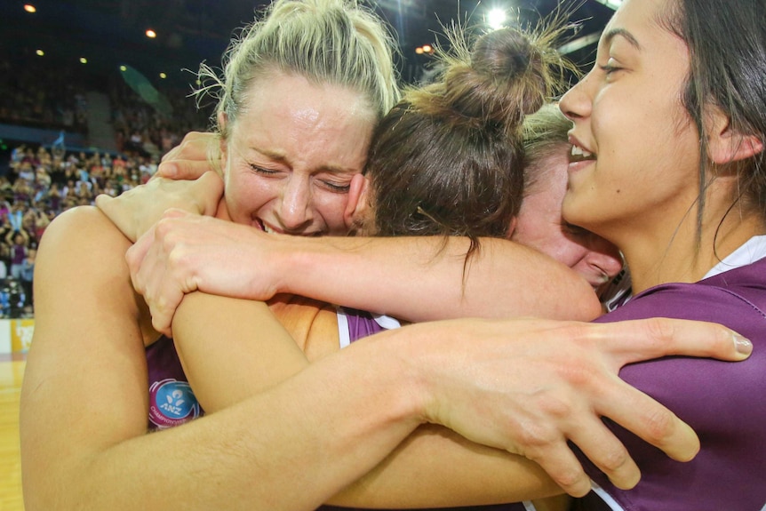 Laura Geitz and the Firebirds celebrate victory