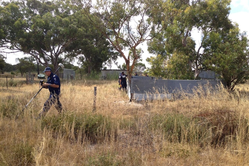 Police search a Badgingarra property for missing teen Hayley Dodd.