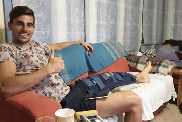 Spanish footballer Javi Verdu Sanchez sitting on a couch.