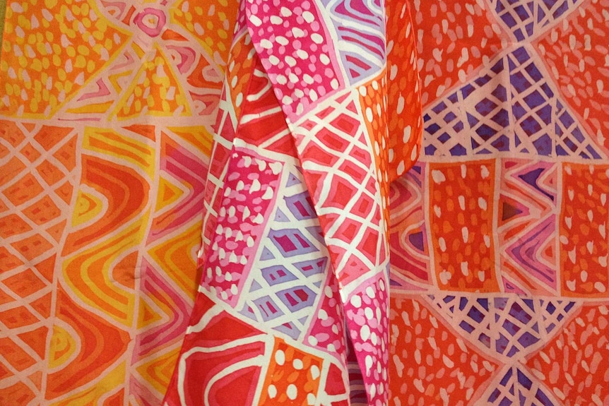 Handpainted silk scarves in bright colours.