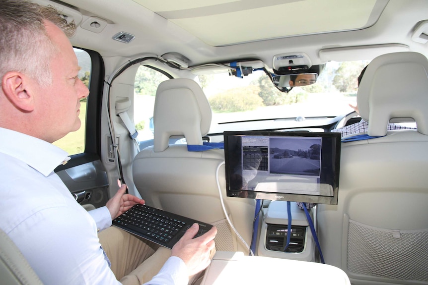 Volvo Australia's technical manager David Pickett in a car.