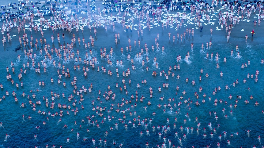 Dark Mofo nude swimmers take the plunge for annual winter 