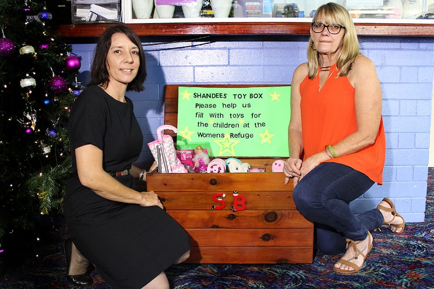 Belinda Hassan and Vicki Blackburn with the box