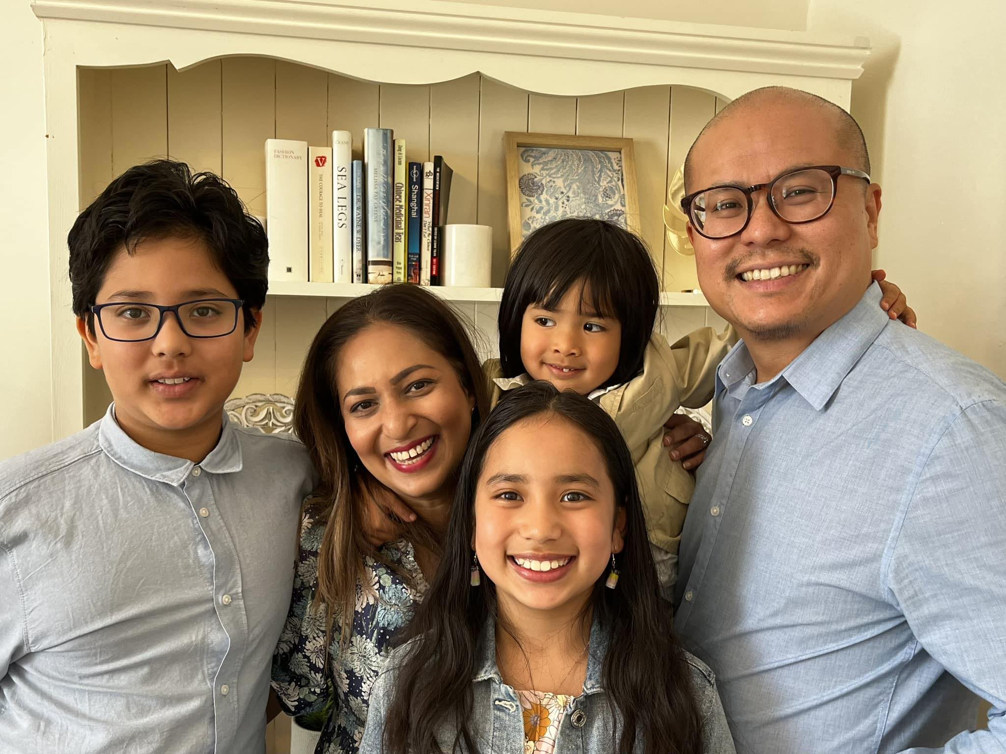 John Ng and with his wife and children
