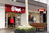 A woman entering a Target store in WA