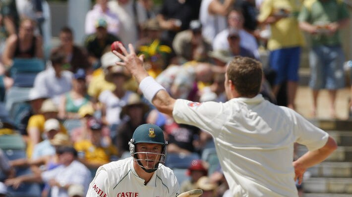 Graeme Smith hits the ball back to the bowler