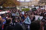 People protest outside state parliament in Hobart