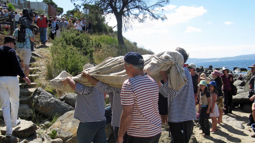 Taroona residents re-enact the burial of seaman James Batchelor.