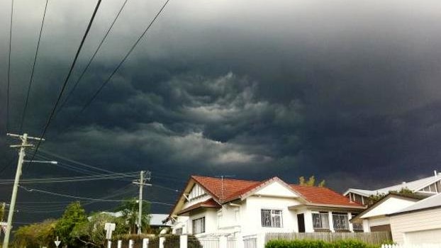 Storm clouds roll in over the Brisbane suburb of Annerley on October 15, 2011.