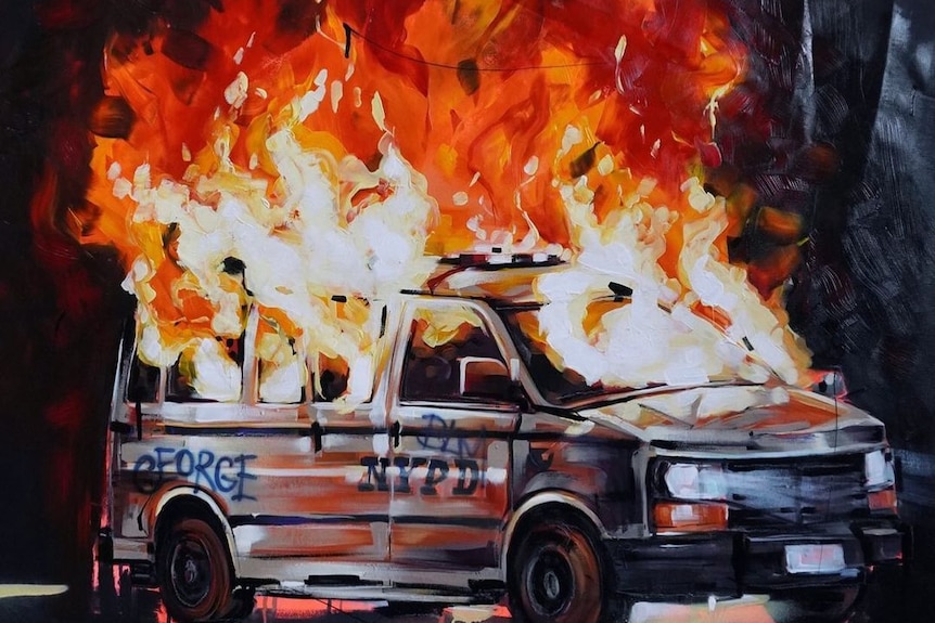 A Black Lives Matter mural in New York of a burning New York City police car with 'George' written on the side.