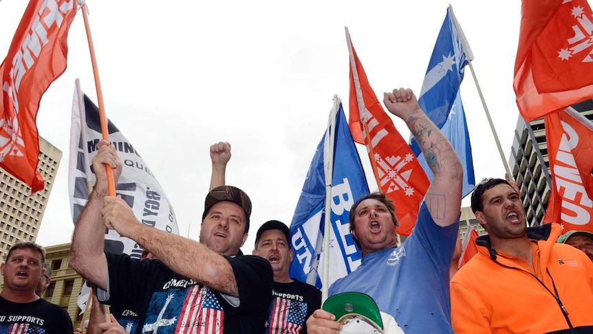 Union members rally against mining industry job cuts