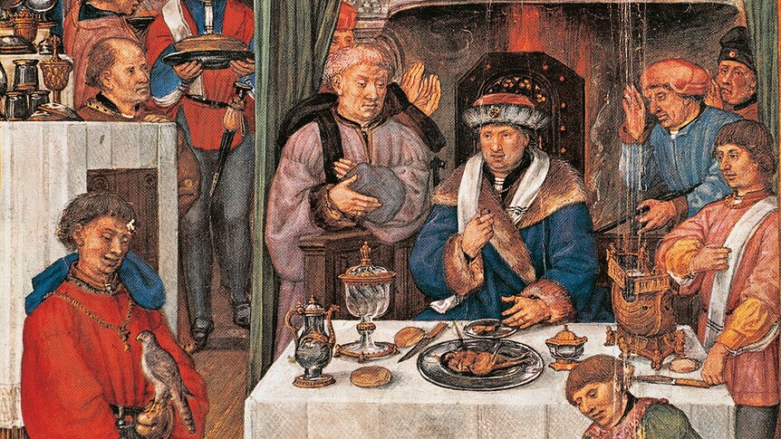 A painting of a rich man in Italy in the 15th Century, eating dinner surrounded by servants. There are no forks.