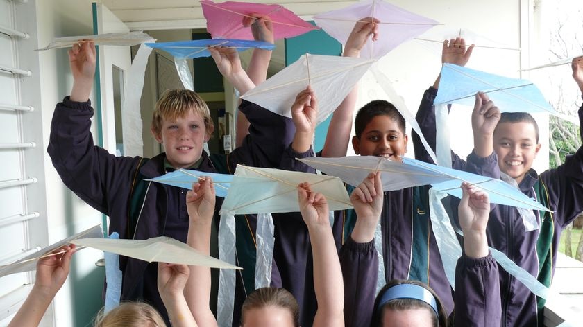 Earnshaw State School students with the kites they made from Brisbane river rubbish for the 2008 Riverfestival.