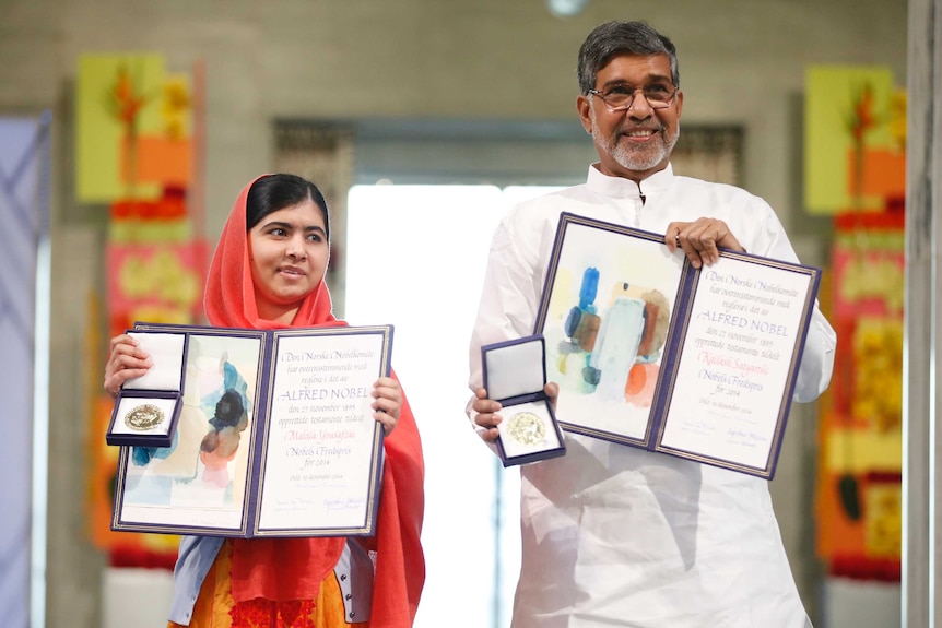 Malala Yousafzai and Kailash Satyarthi at the 2014 Nobel Peace Prize ceremony