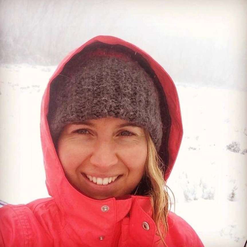 Selfie of Libby surrounded by snow and bare trees, she's an expat who's lived in both Melbourne and Vienna.