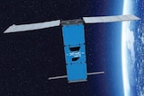 A mock-up satellite floating through space