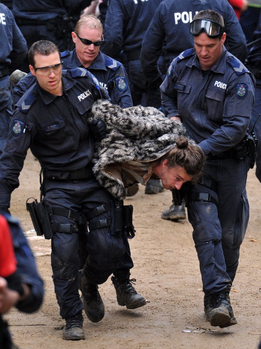 Occupy protestors are removed by police at City Square in Melbourne