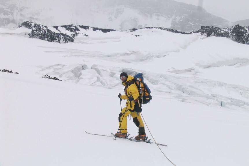 Glaciologist Doug Thost on a glacier