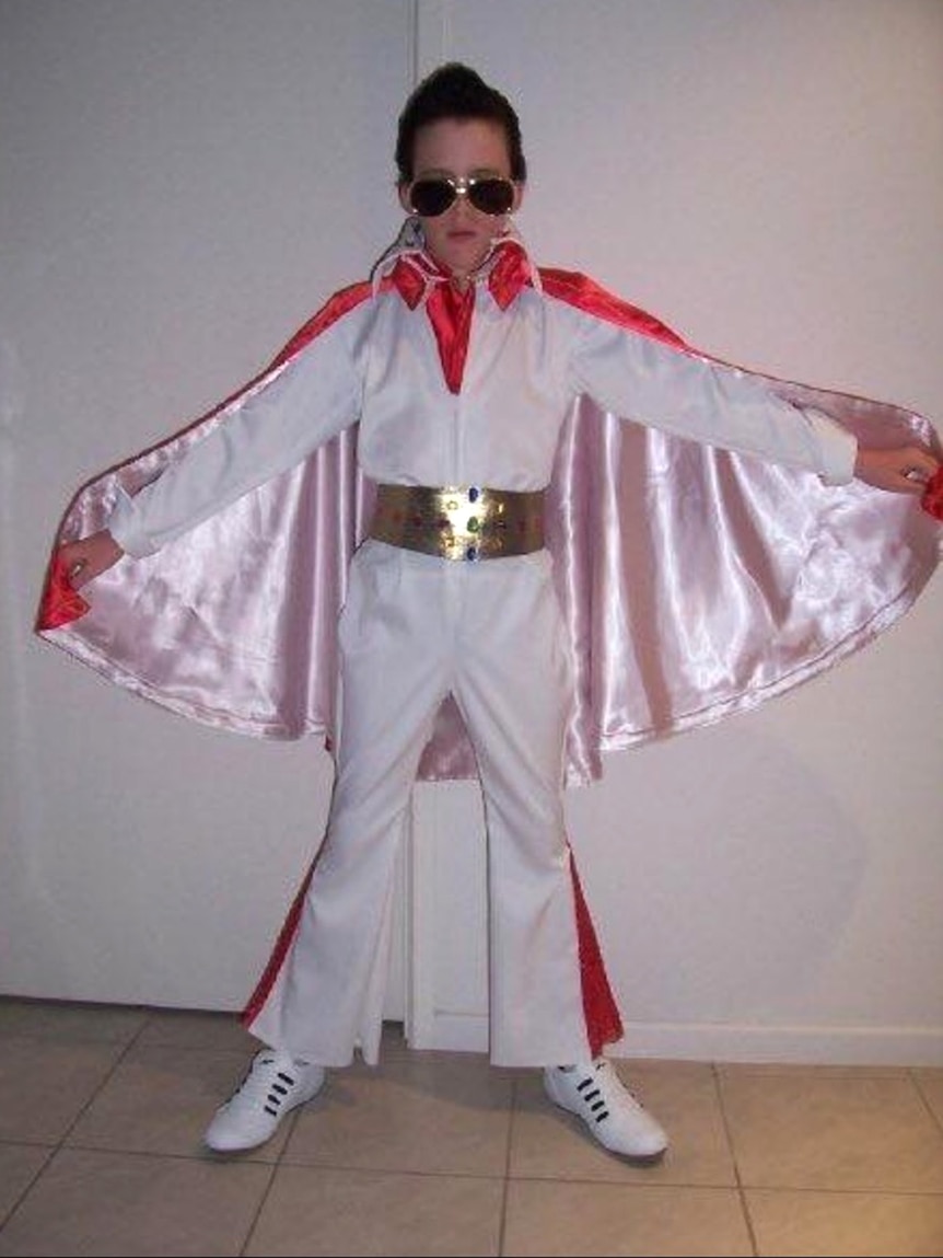 Elvis tribute artist Brody Finlay aged seven wearing an Elvis jumpsuit