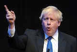 Boris Johnson speaks and wags his finger during a fringe event during the Conservative Party annual conference in Birmingham.