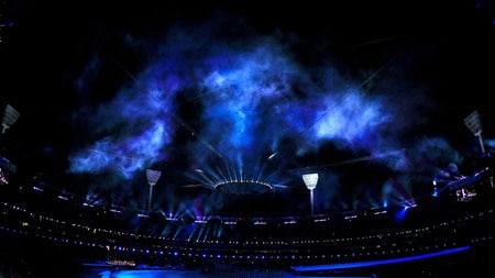 The Melbourne Cricket Ground lit up during the opening ceremony.