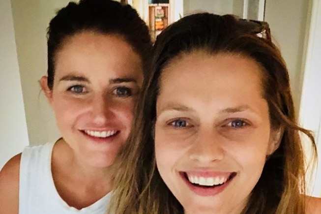 Jockey Michelle Payne with actress Teresa Palmer.