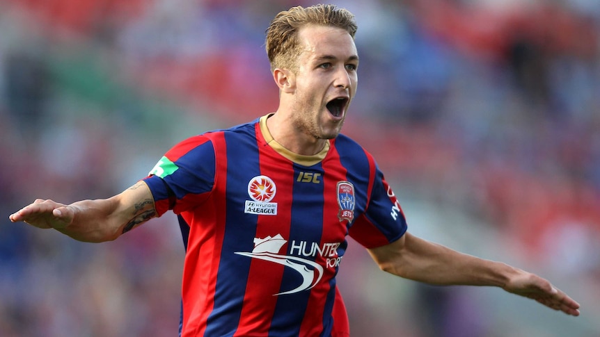 Newcastle's Adam Taggart celebrates a goal during the round seven A-League match between the Jets and the Melbourne Heart at Hunter Stadium in November last year.