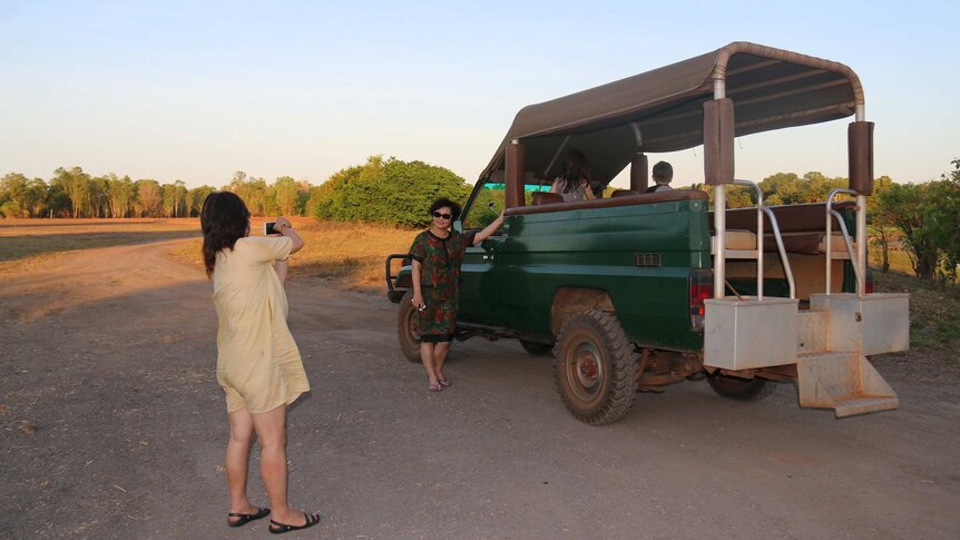 Chinese tourists take photos in Kakadu National Park