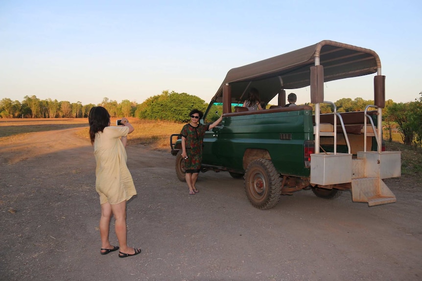 Chinese tourists take photos in Kakadu National Park