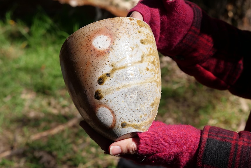 A pot fired with ash glaze 