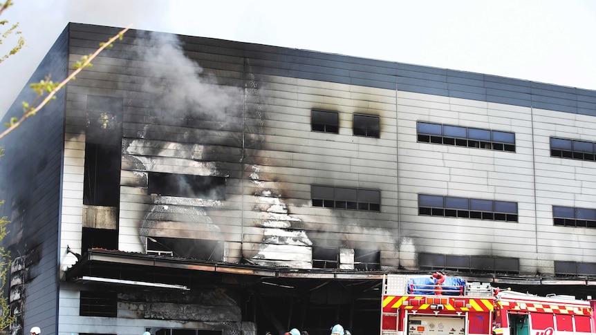 Smoke billows from the site of a fire in South Korea