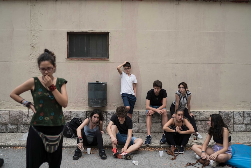 Students occupying the Institut Moises Broggi. The school is a would-be polling place.